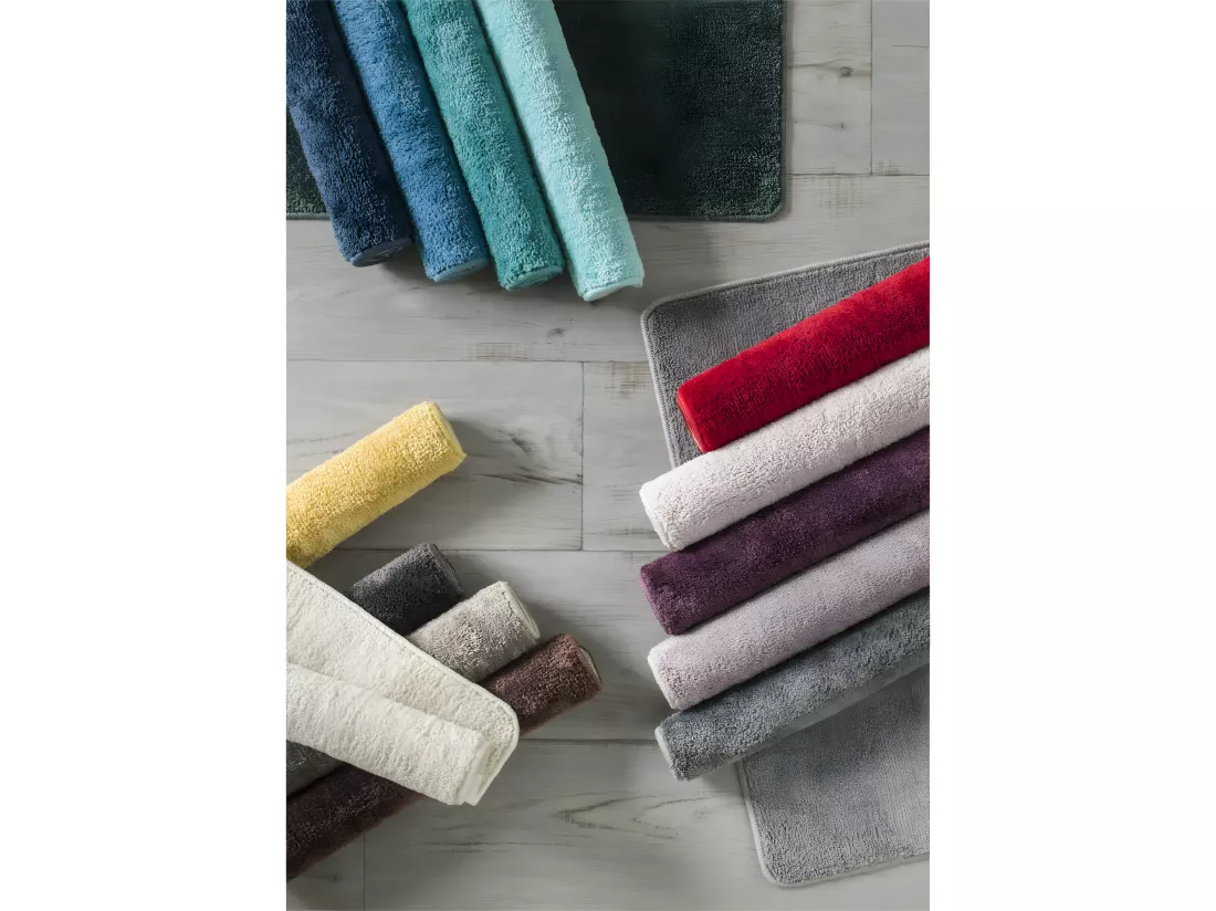 Tapis de bain uni en polyester miel 50x80cm