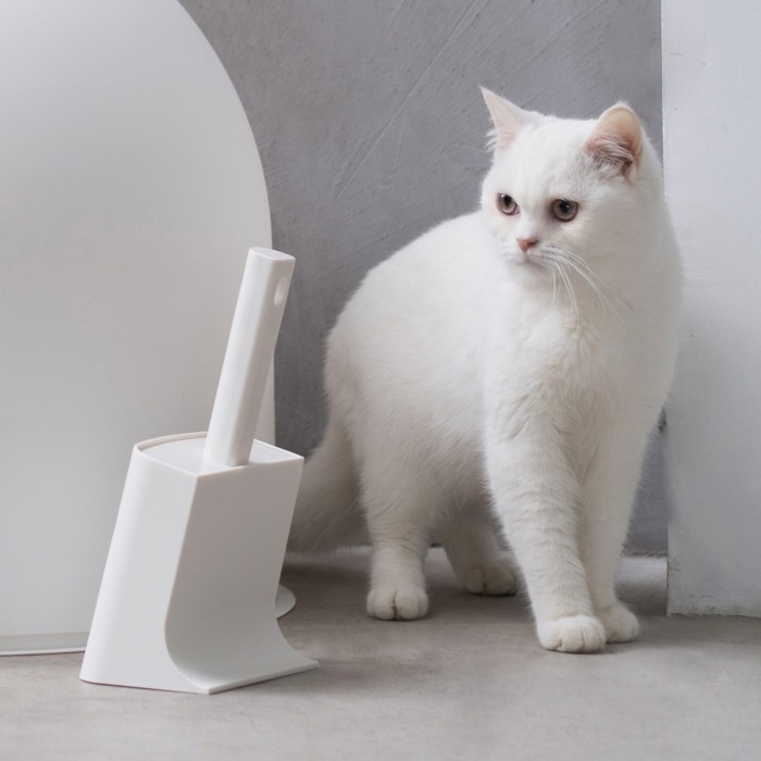 Pelle à litière avec support