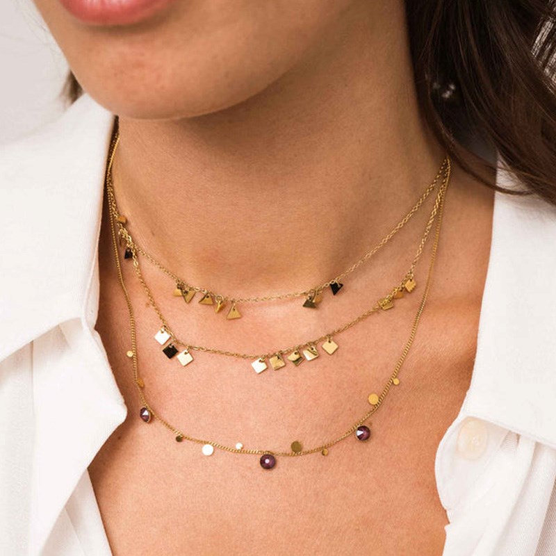Collier en acier doré avec cristaux orange