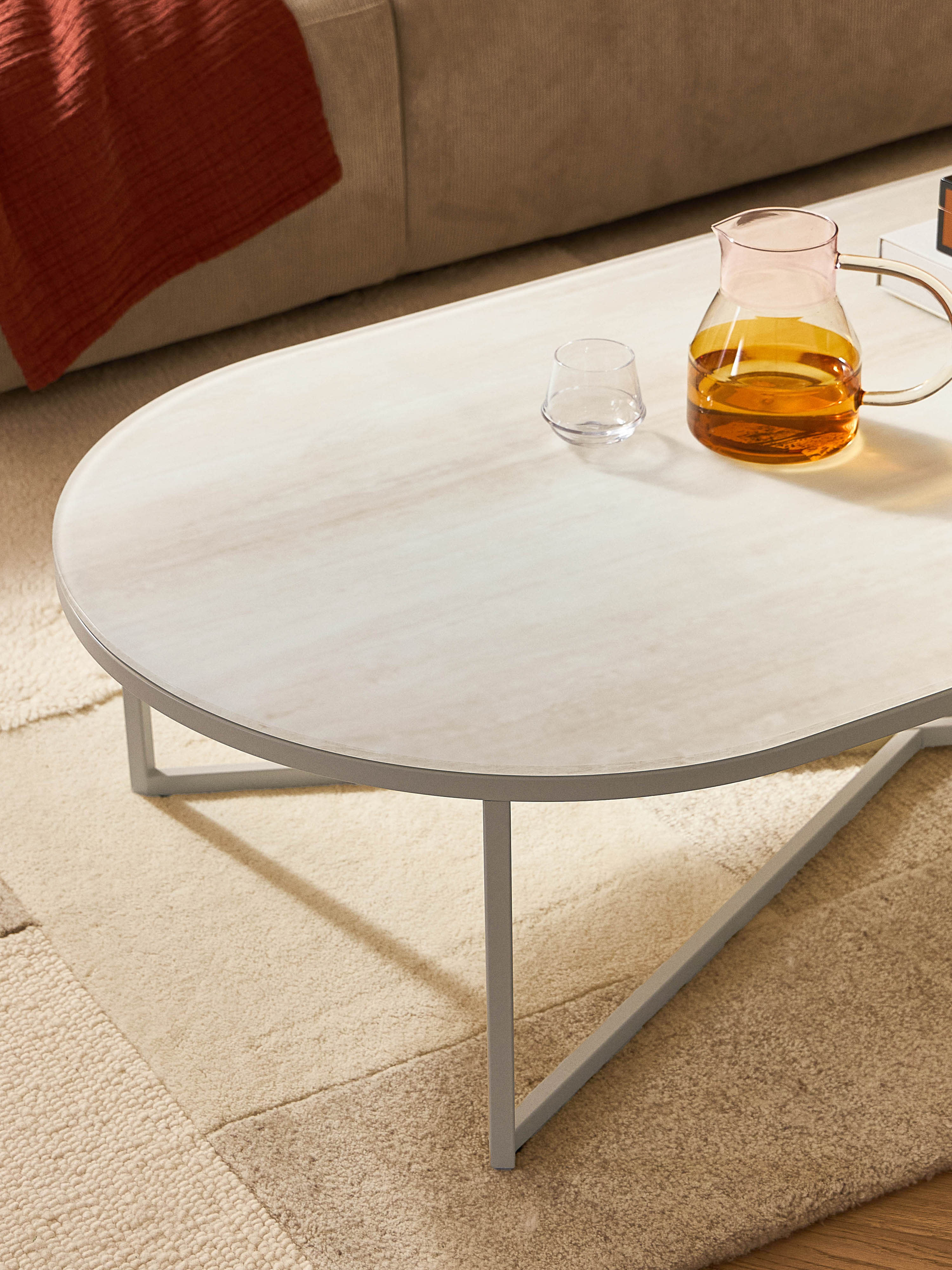 Ovale salontafel Antigua met glazen tafelblad in marmerlook