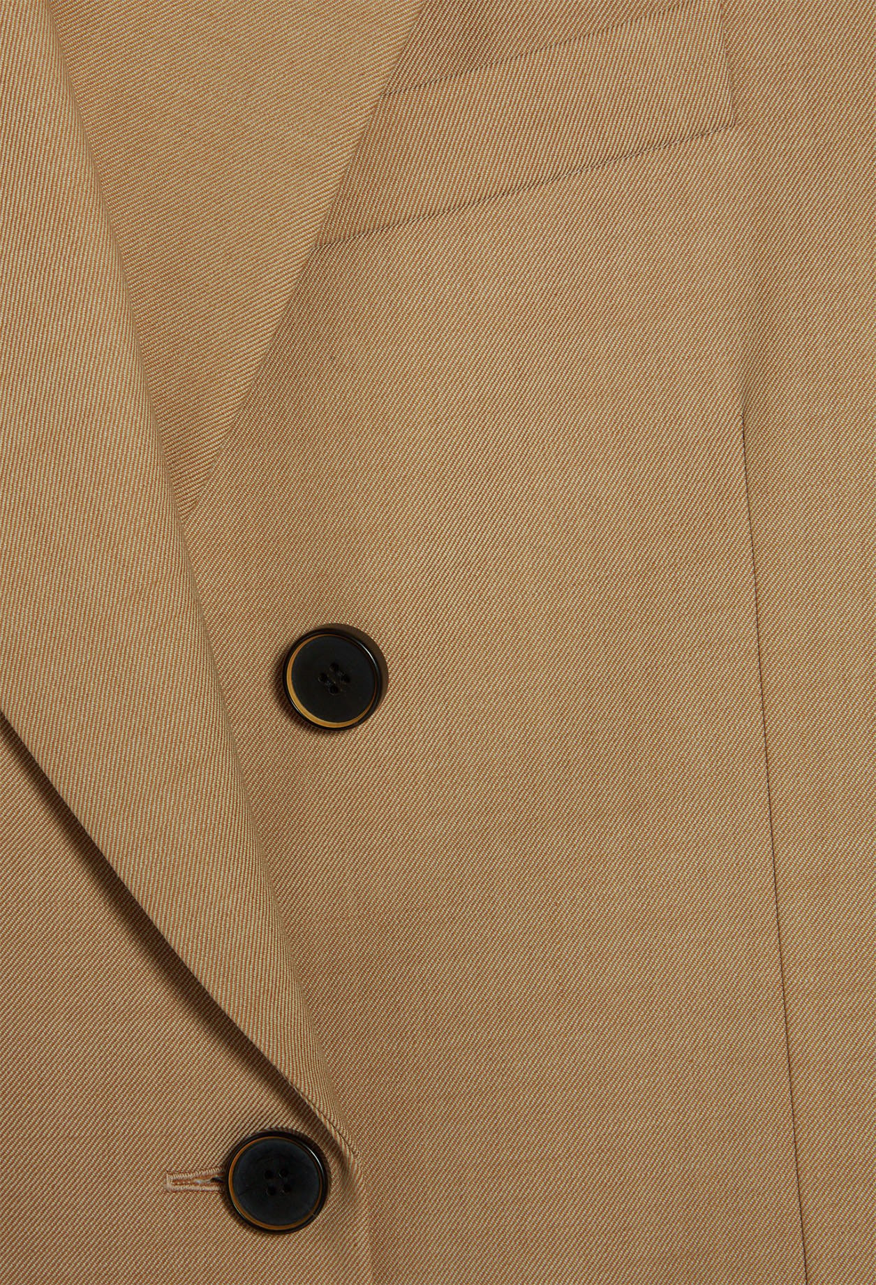 Veste sans manches en laine tra&ccedil;able