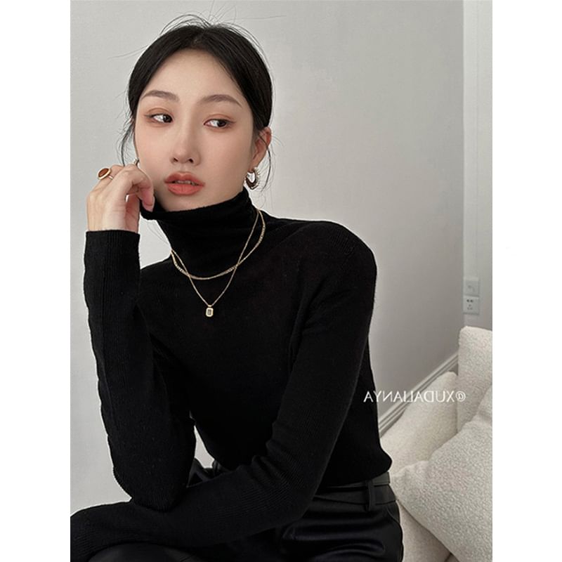Secolo - Effen gebreide top met lange mouwen en hoge hals