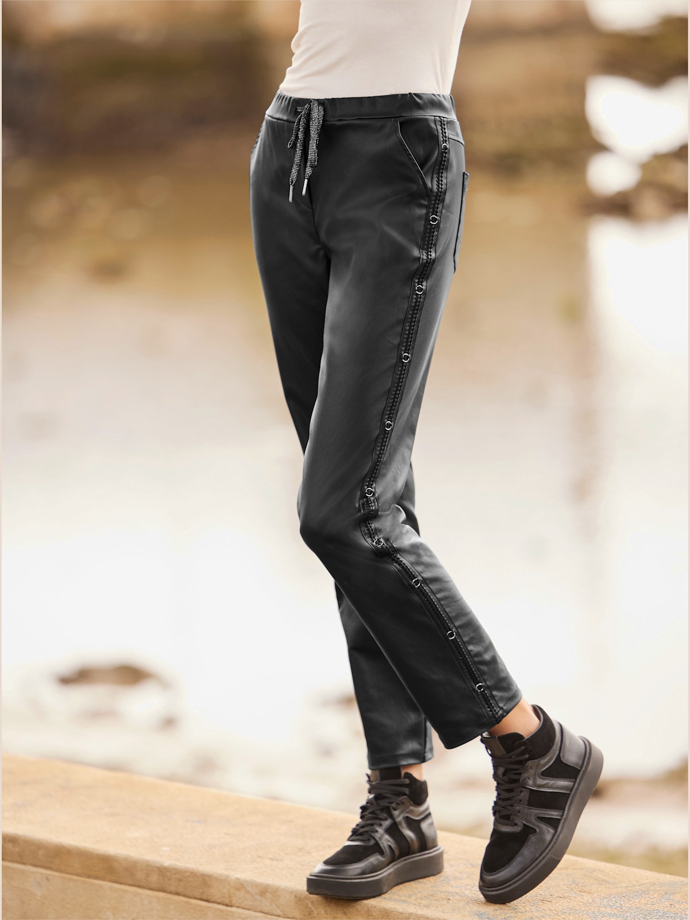 Pantalon avec tressage