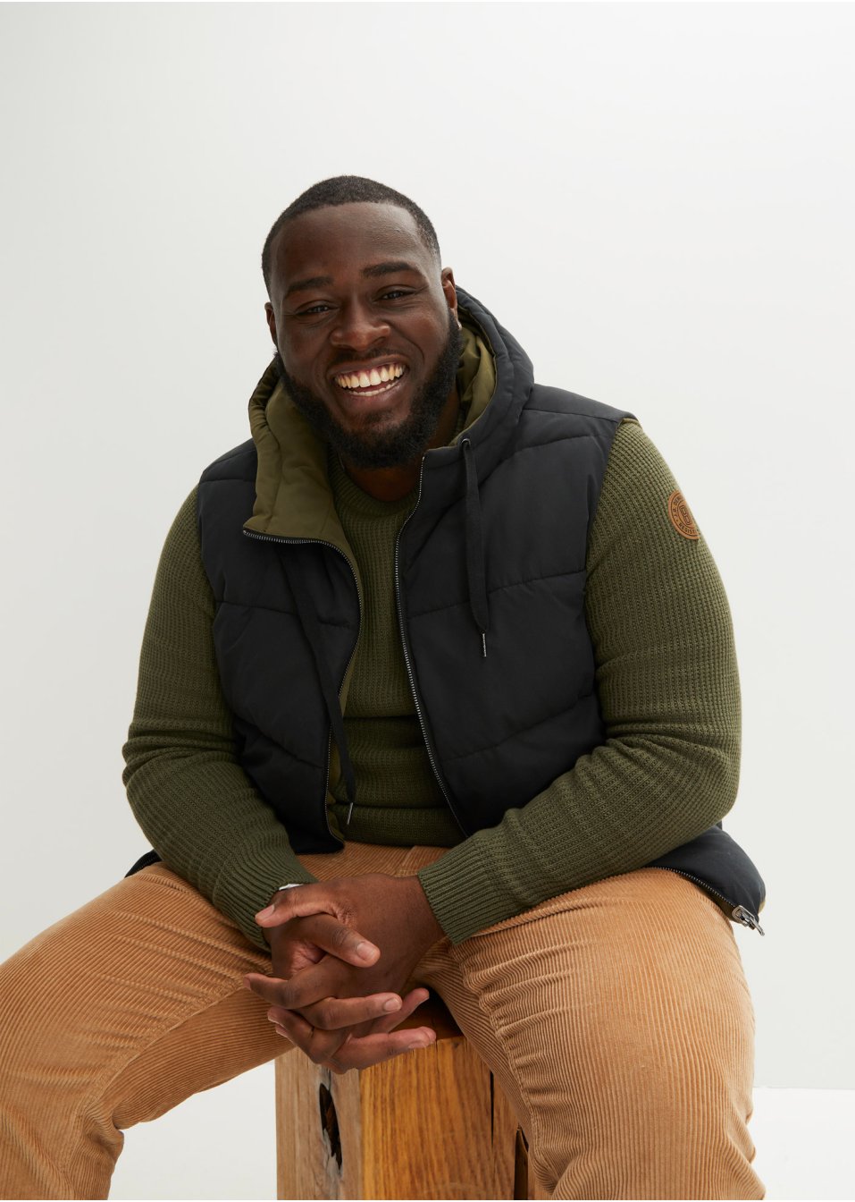Veste sans manches matelassée réversible avec capuche en polyester recyclé
