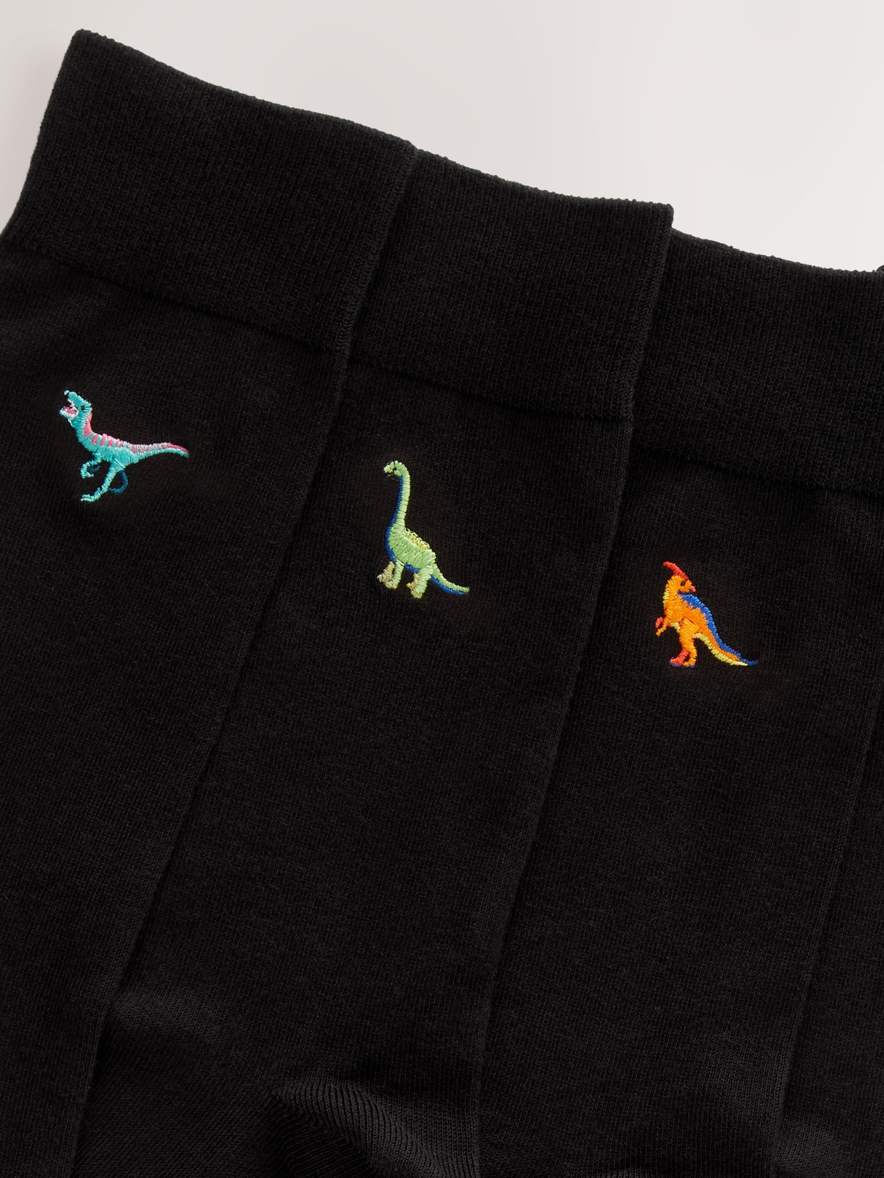 Felgekleurd met dinoprint - [#8]} paar sokken met leuk borduursel
