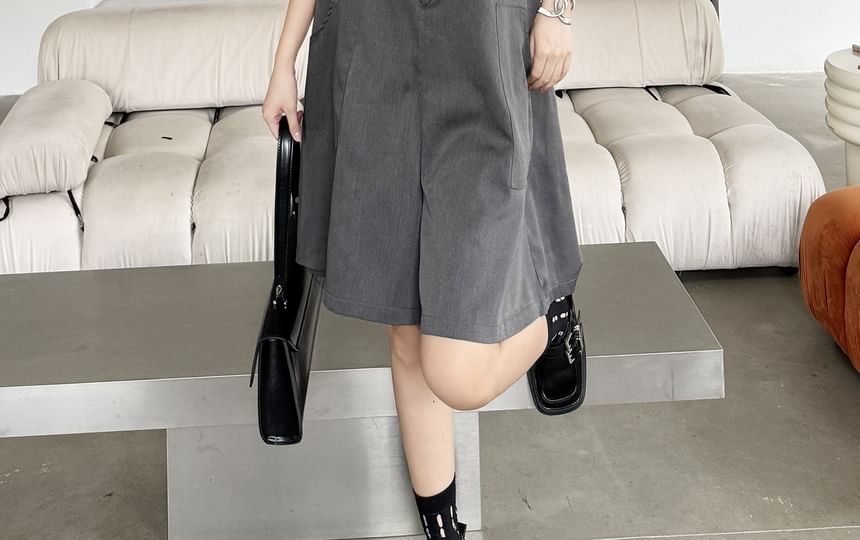 KUMI - Mouwloze V-hals romper