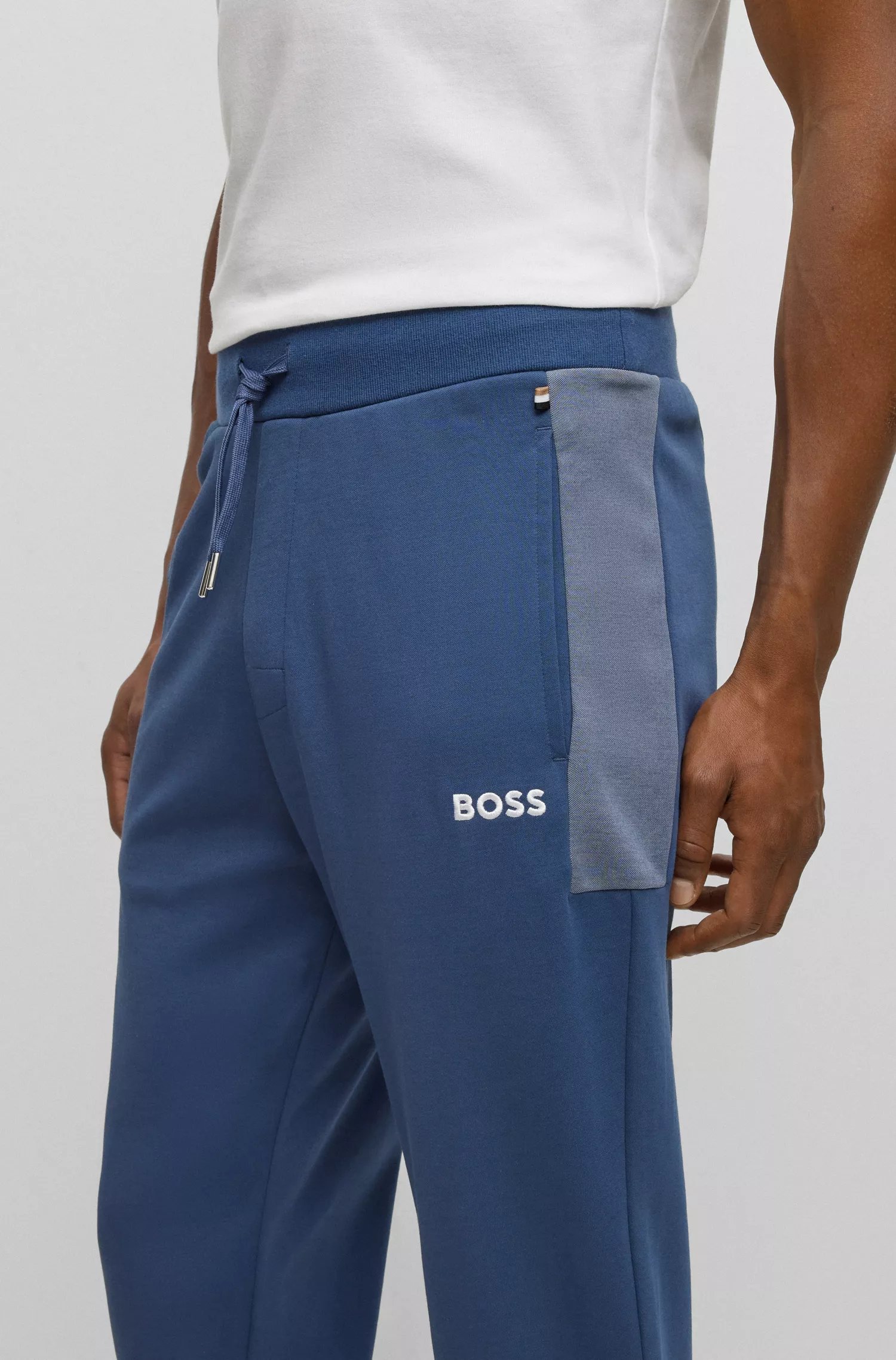 Calça de fato de treino BOSS em mistura de algodão preto com logótipo bordado
