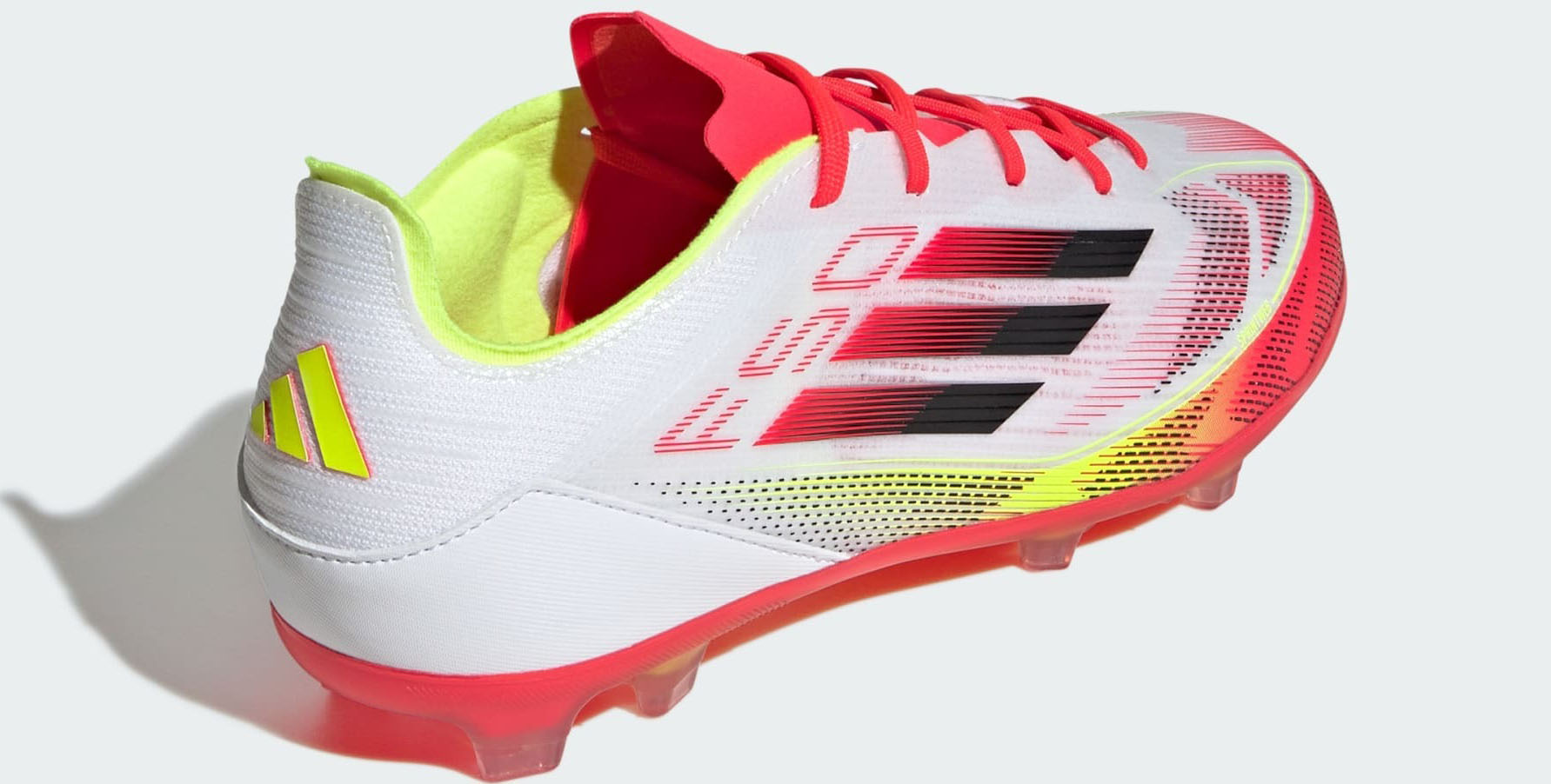 F50 Elite FG Junior Cloud White/Core Black/Solar Yellow