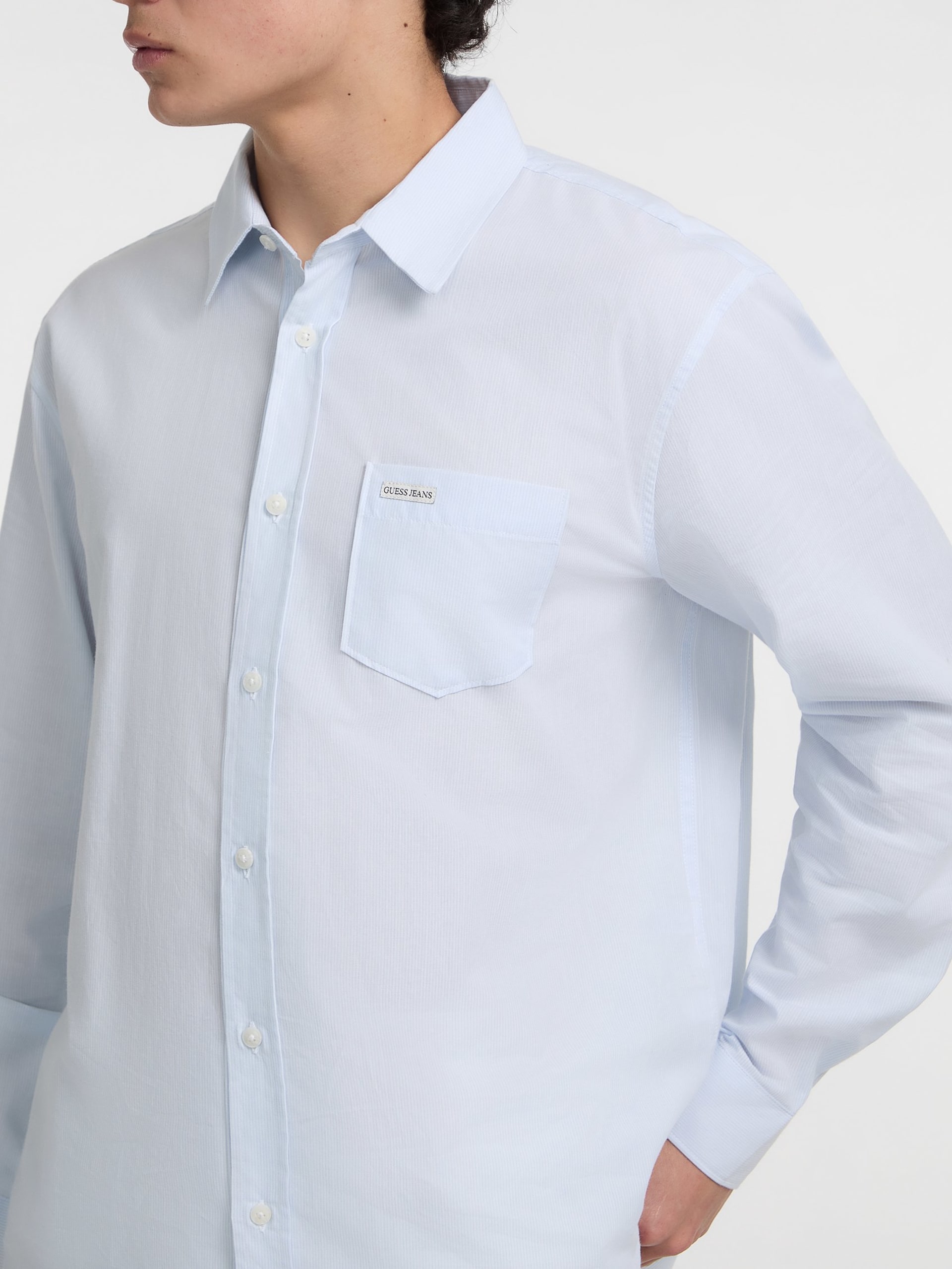 Camisa listrada com bolso