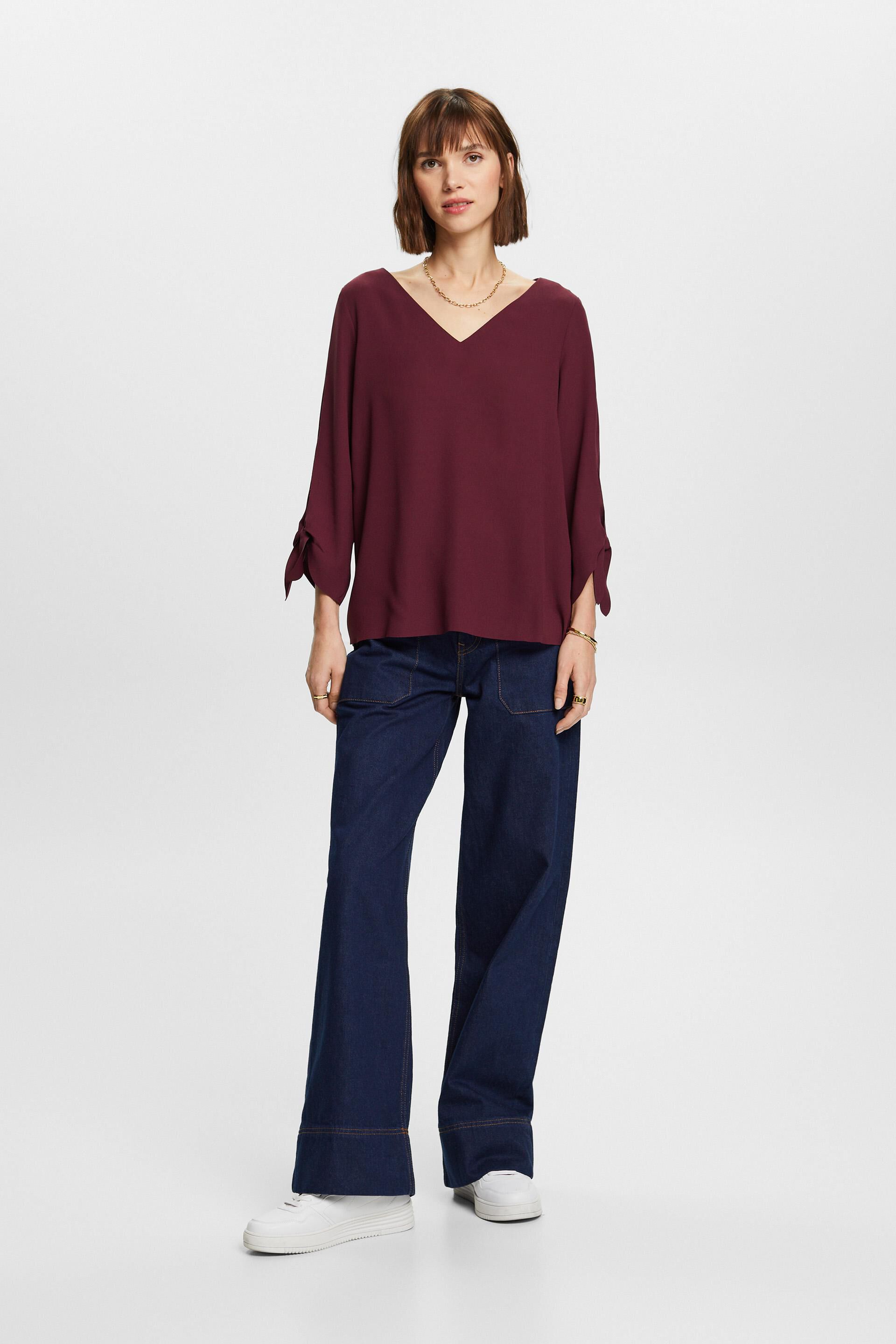 Blouse stretch à bords bruts