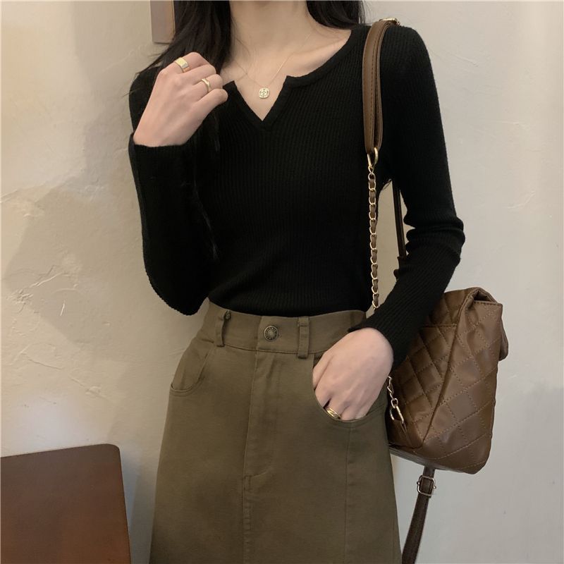 Closette - Gebreide top met lange mouwen en open knoopsluiting