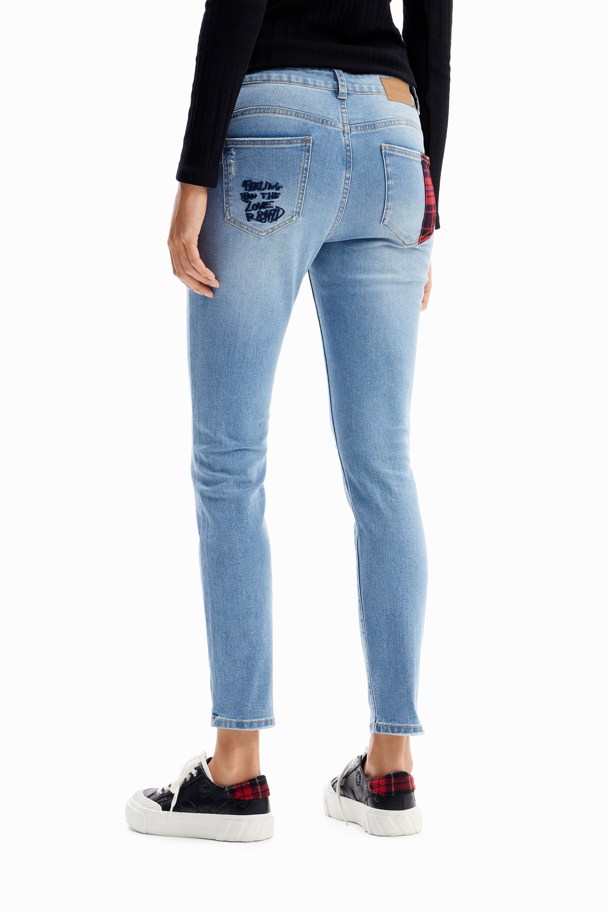 Vaqueros Slim flexões Mickey Mouse