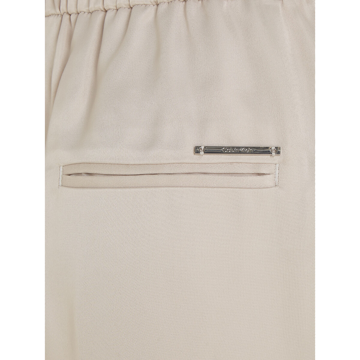 CALVIN KLEIN<br>Calças largas de cetim