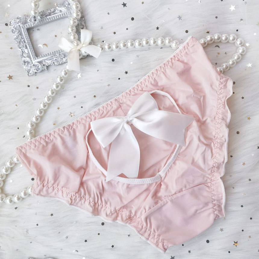 Wildery - Tweekleurige panty met strik en uitsparing