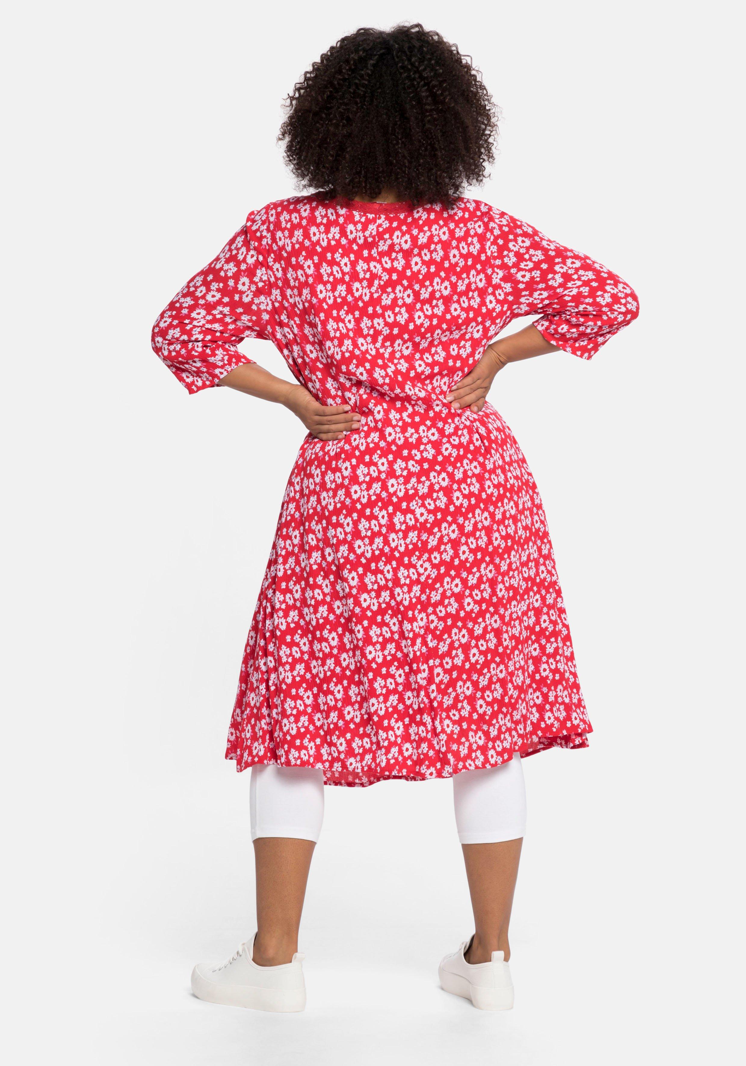 Kleid mit Blumendruck und Spitzenbesatz