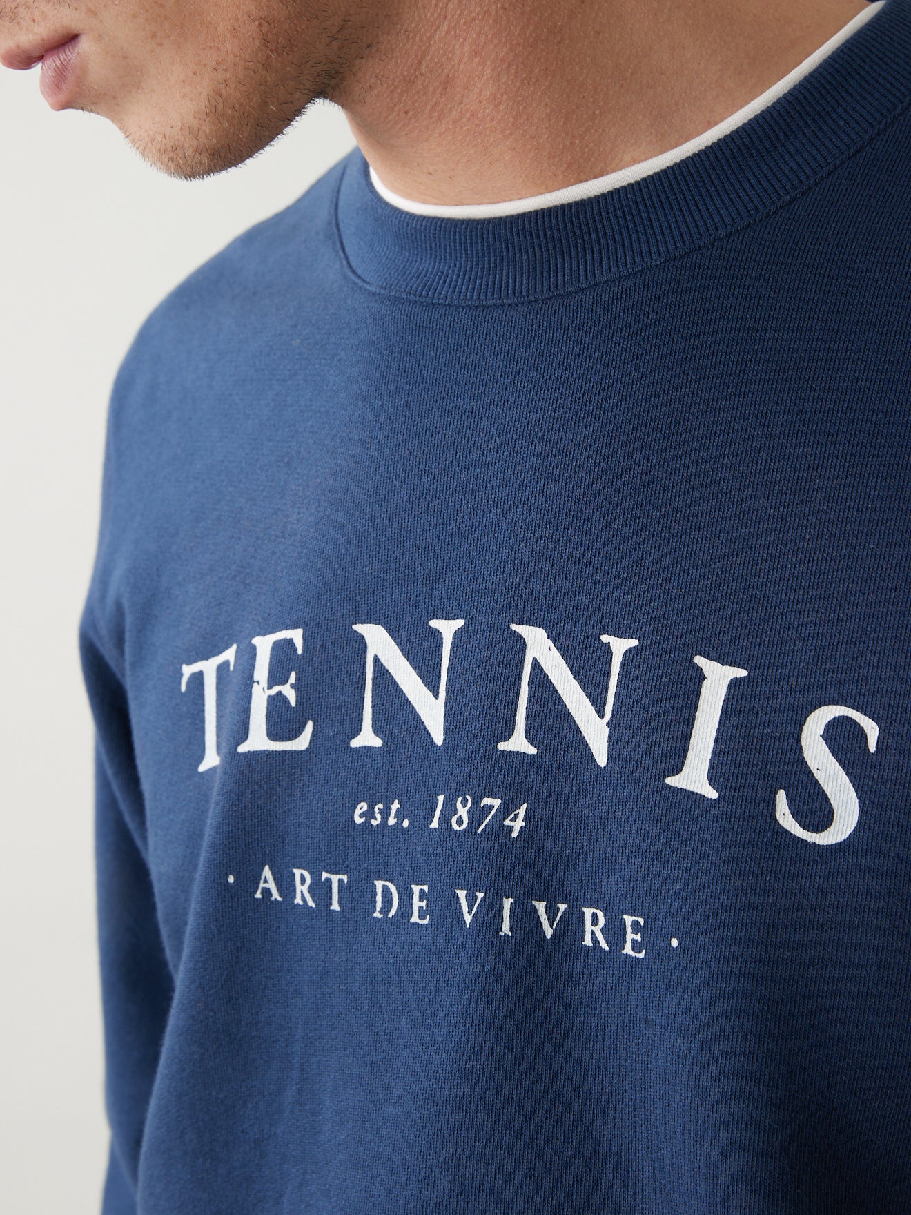 Sweat uni motif placé homme
