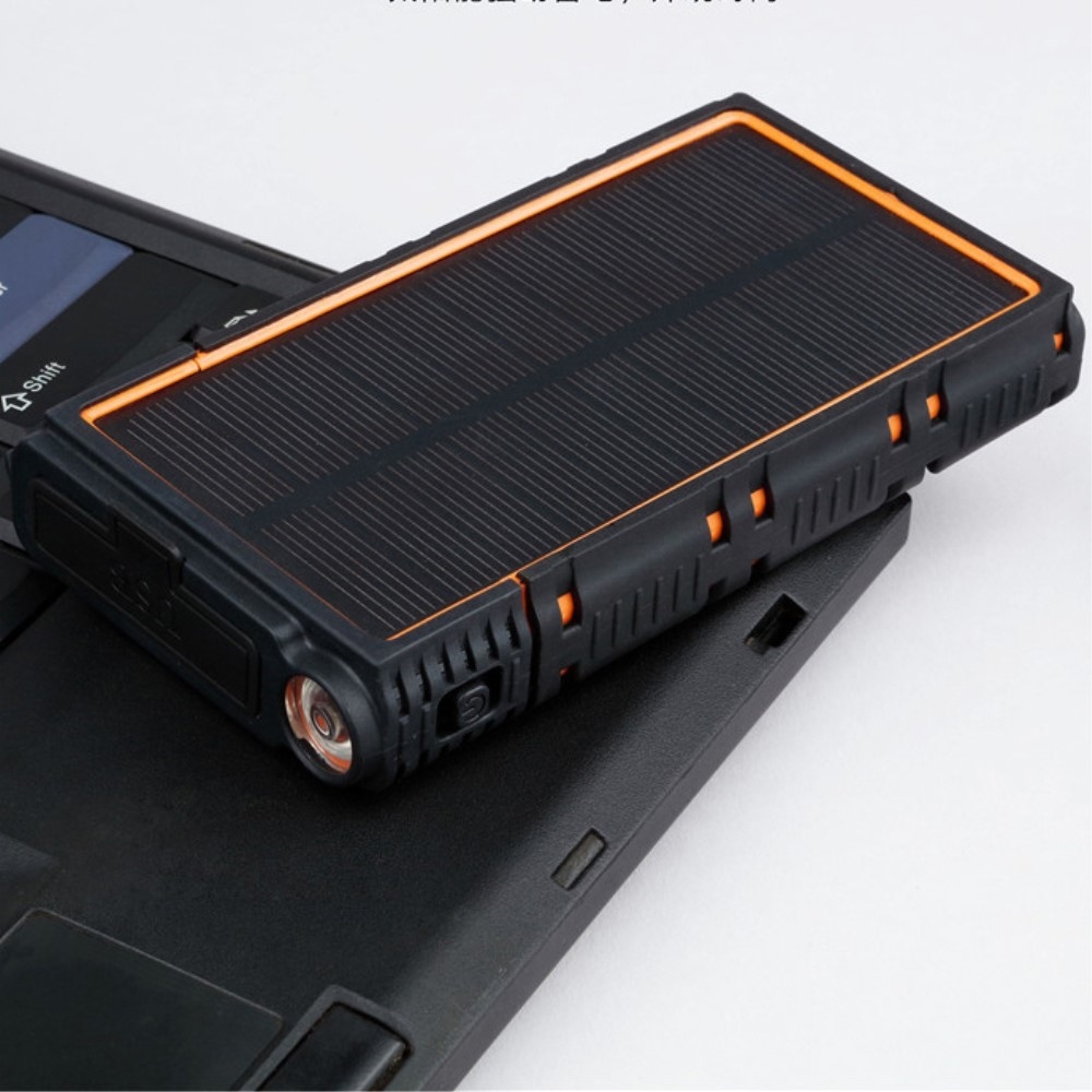 Spritzwassergeschütze 1.5W Outdoor Solar Powerbank 10000mAh mit Taschenlampe (IP66) - Schwarz / Orange