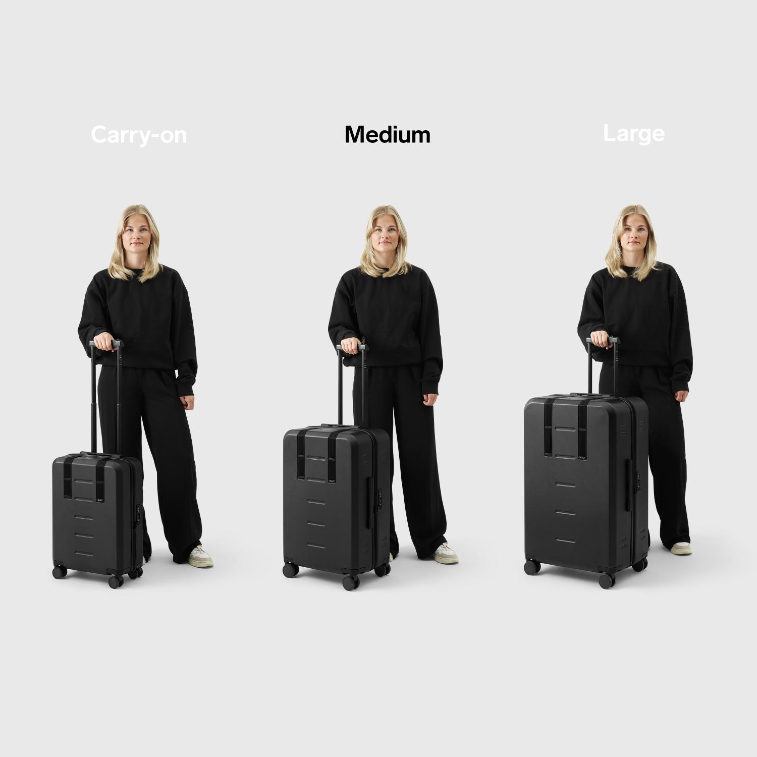 Db Ramverk Check-In Luggage Medium Black Out