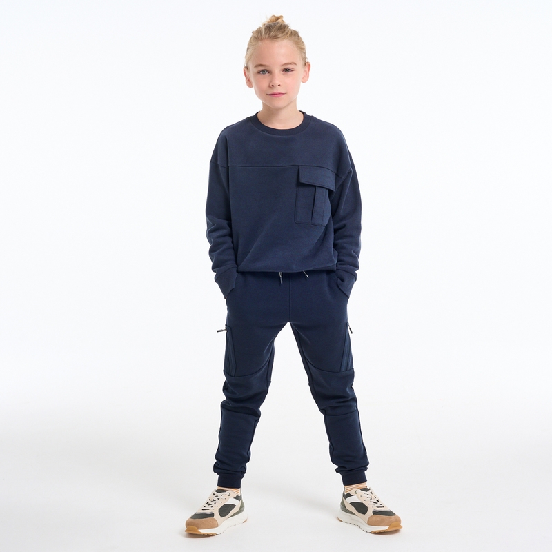 Pantalon de jogging molleton poches zippées bleu garçon