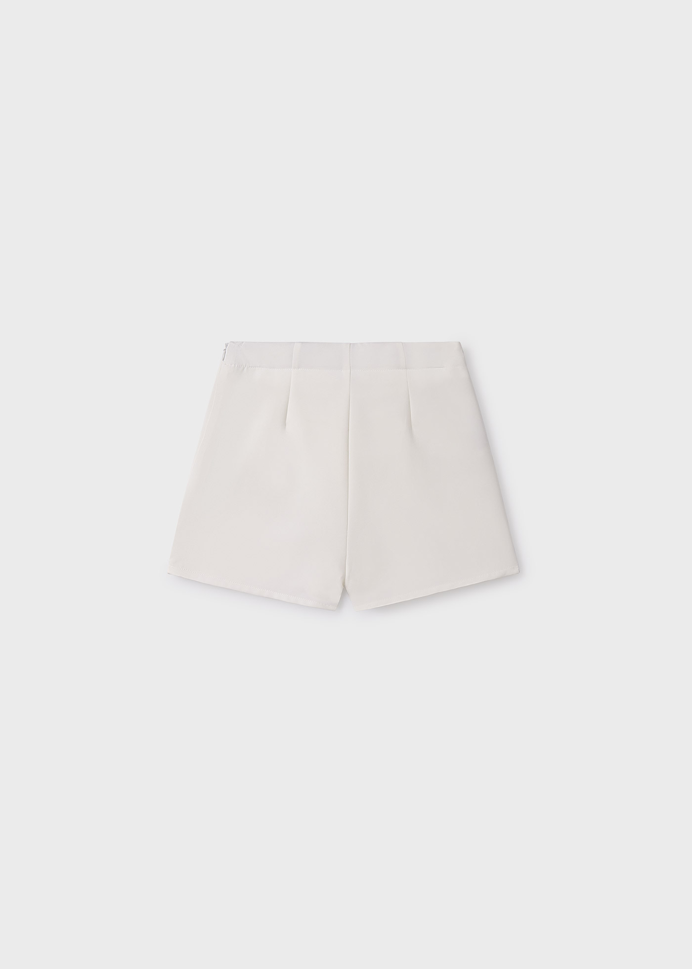 Saia-calça com laço, cor creme para menina