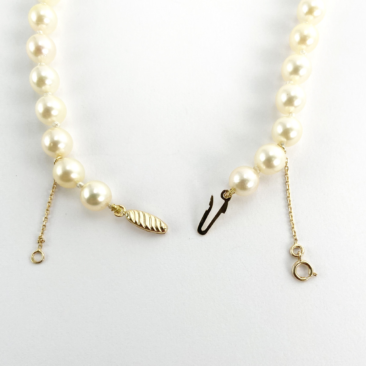 Collier d'occasion or 750 jaune perles de culture 46cm