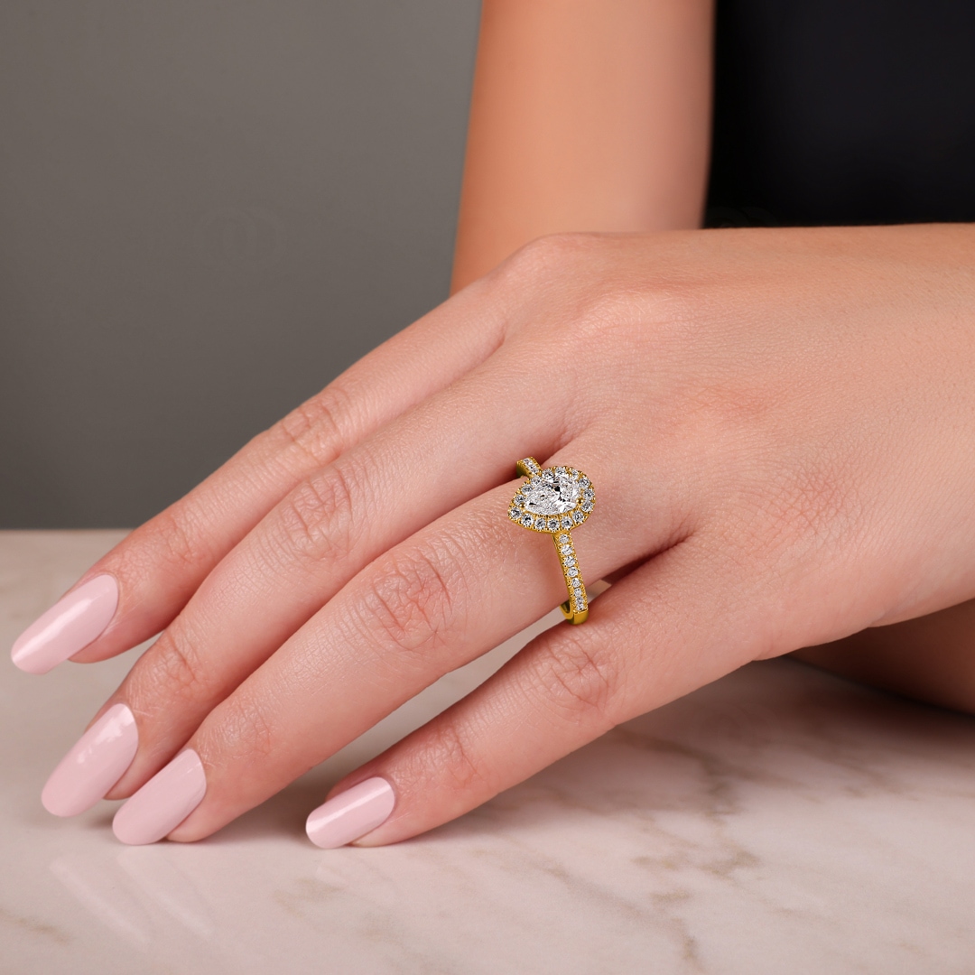 Tropfen Halo Diamantring 750/18 K Gelbgold 0.63 ct G/si