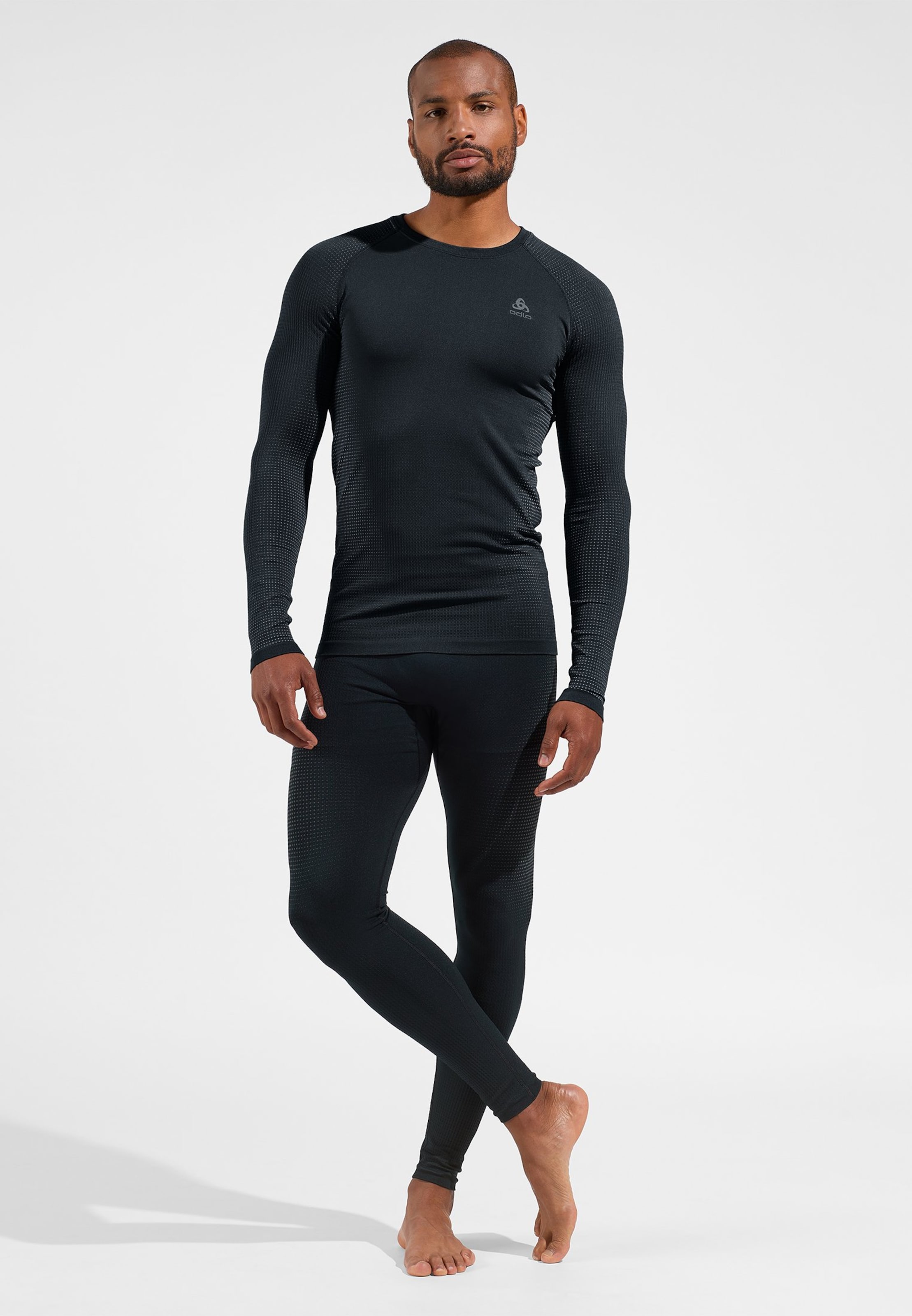 Performance Warm Base Layer Tights in black - odlo graphite grey