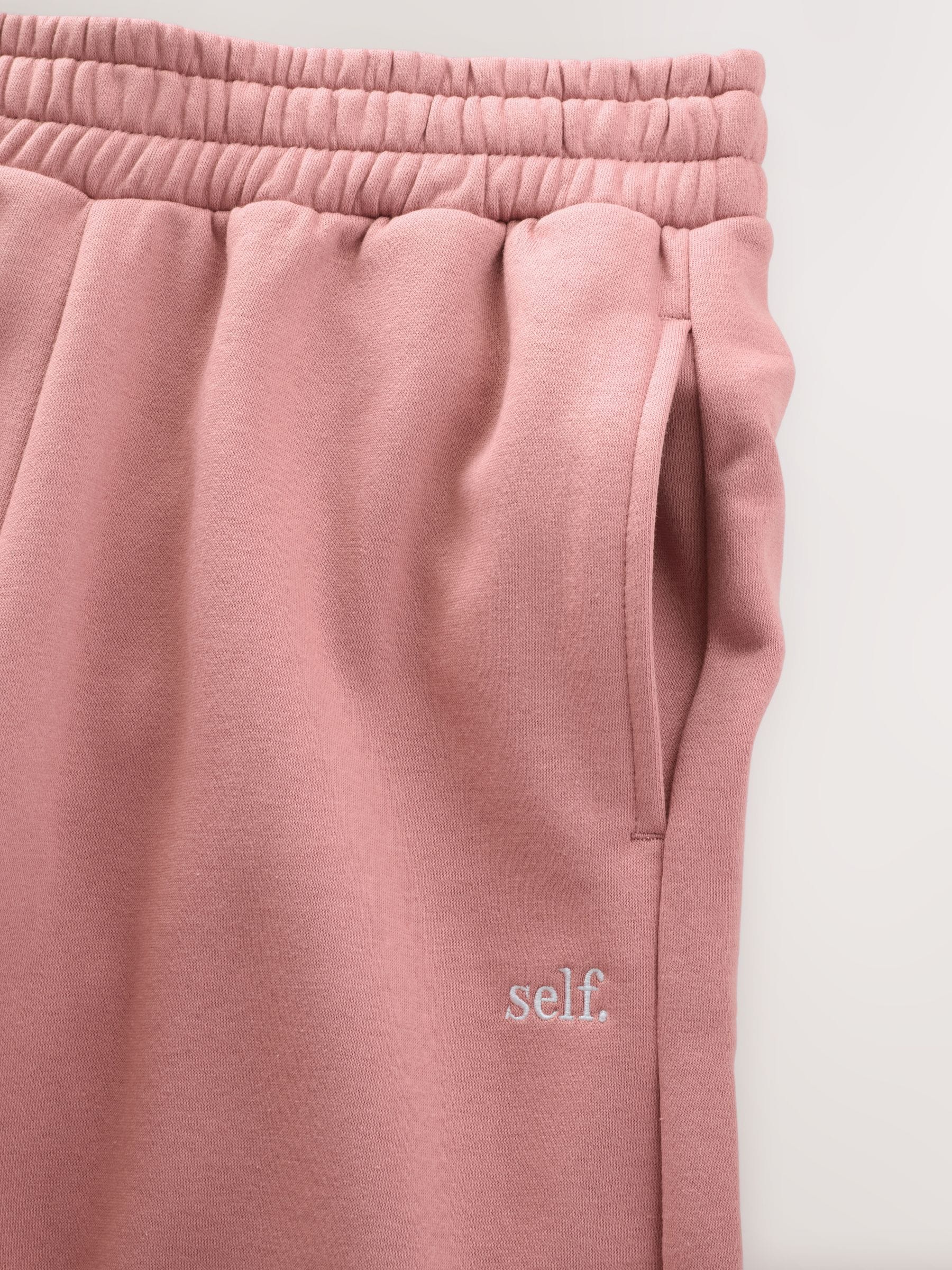 Roze - self. joggingbroek met wijde pijpen