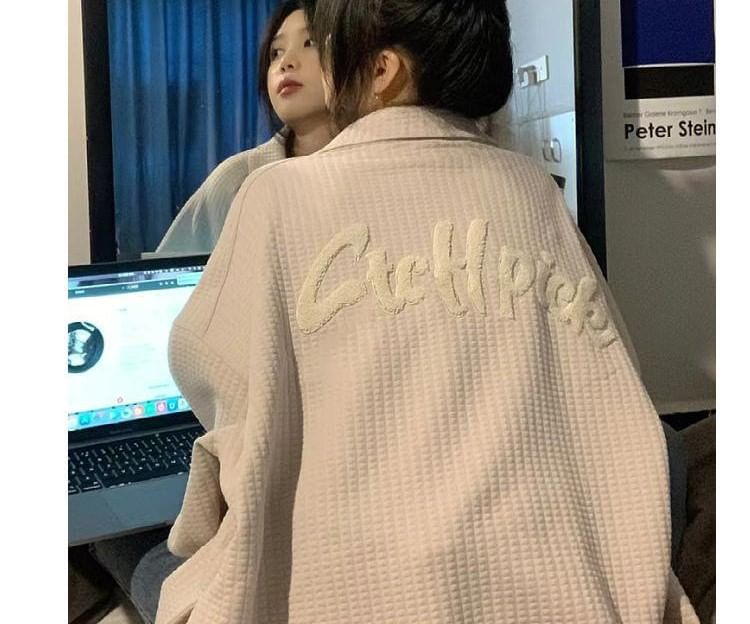 Essere - Vest met rits en appliqué op de kraag