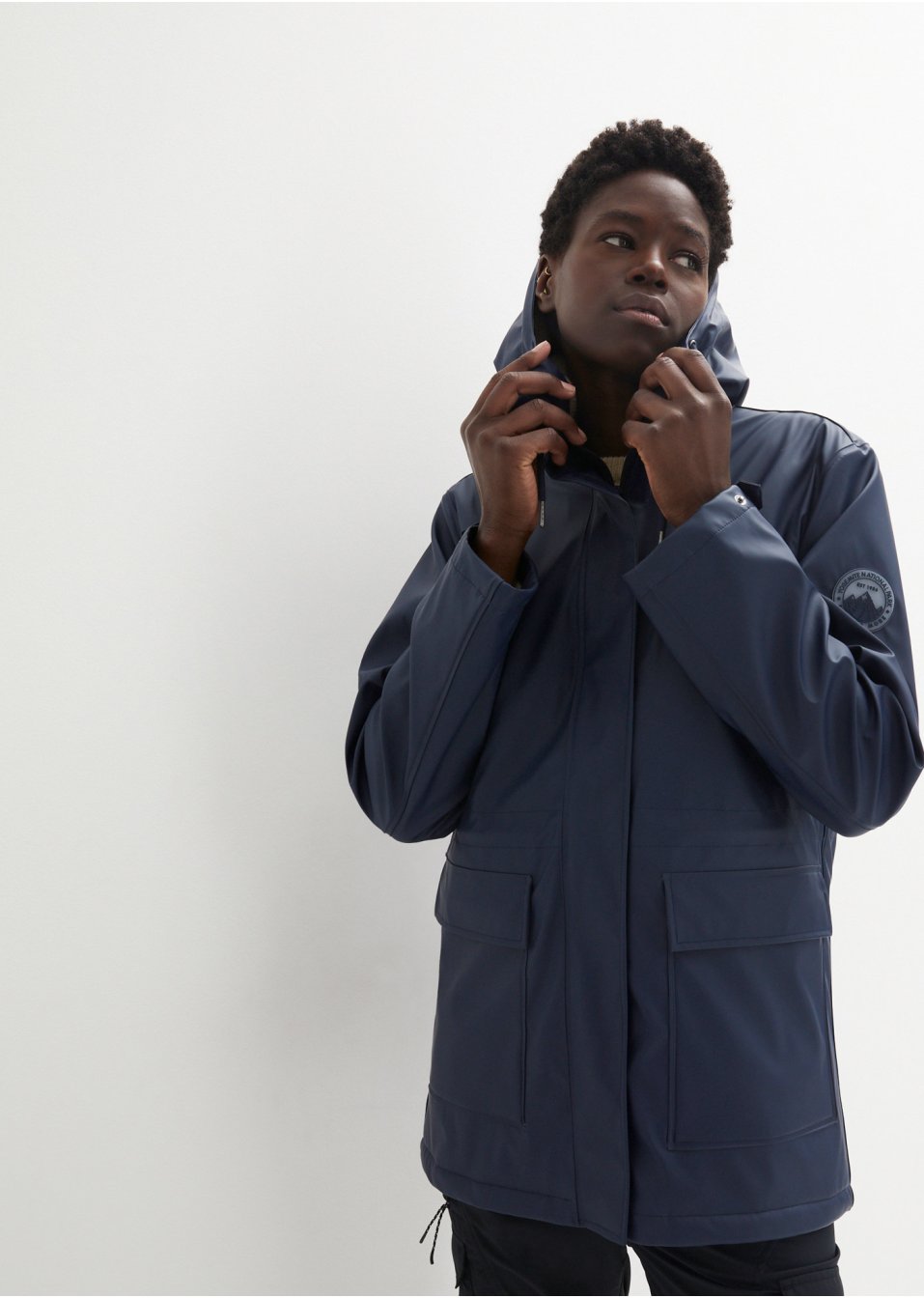 Veste de pluie avec doublure peluche en matériau étanche