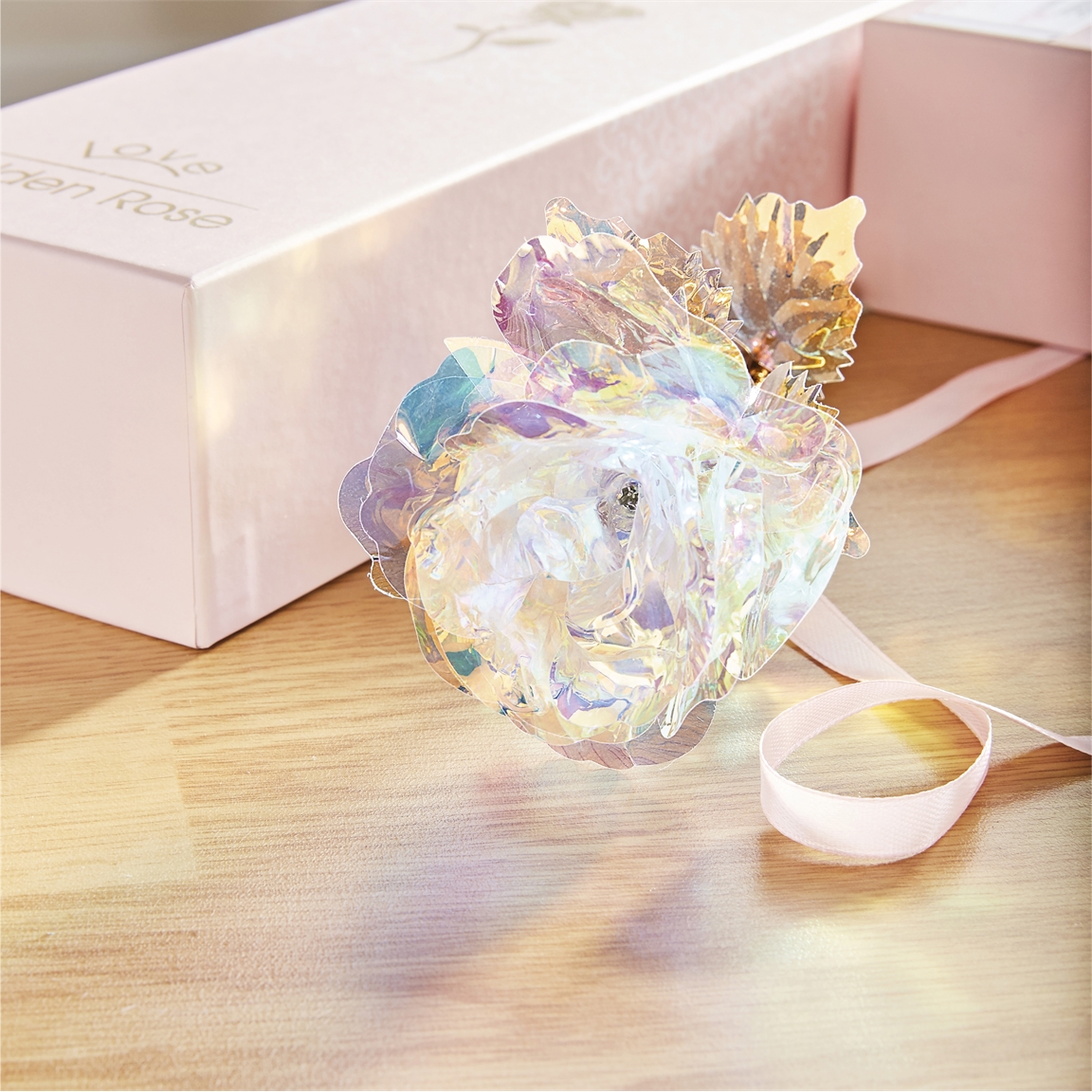Rose dans son coffret