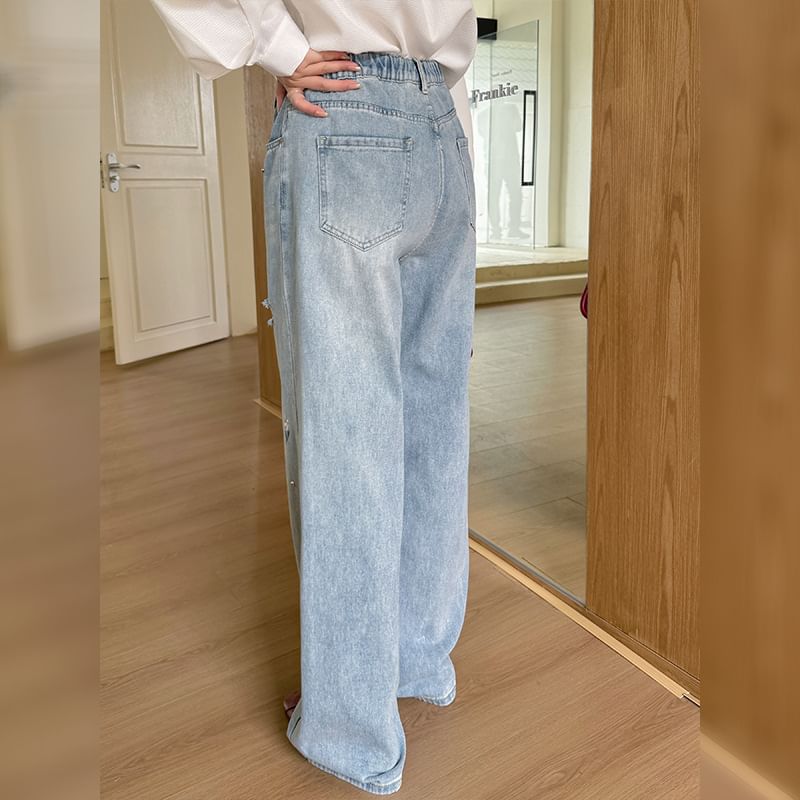 Ashteroid - Hoge taille, bloemenborduursel, gewassen gescheurde wijde pijpen jeans