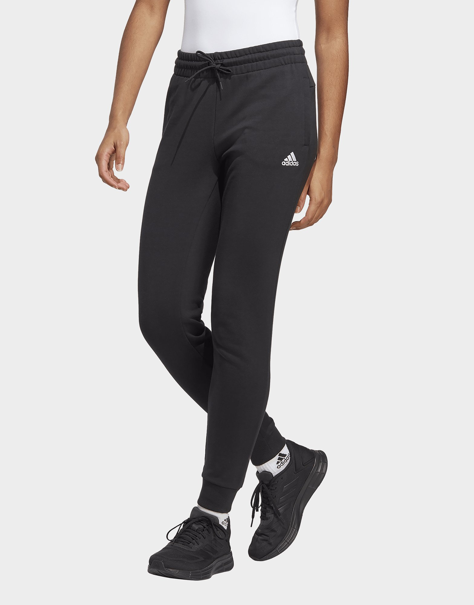 adidas Pantalon en molleton à chevilles élastiques Essentials Linear