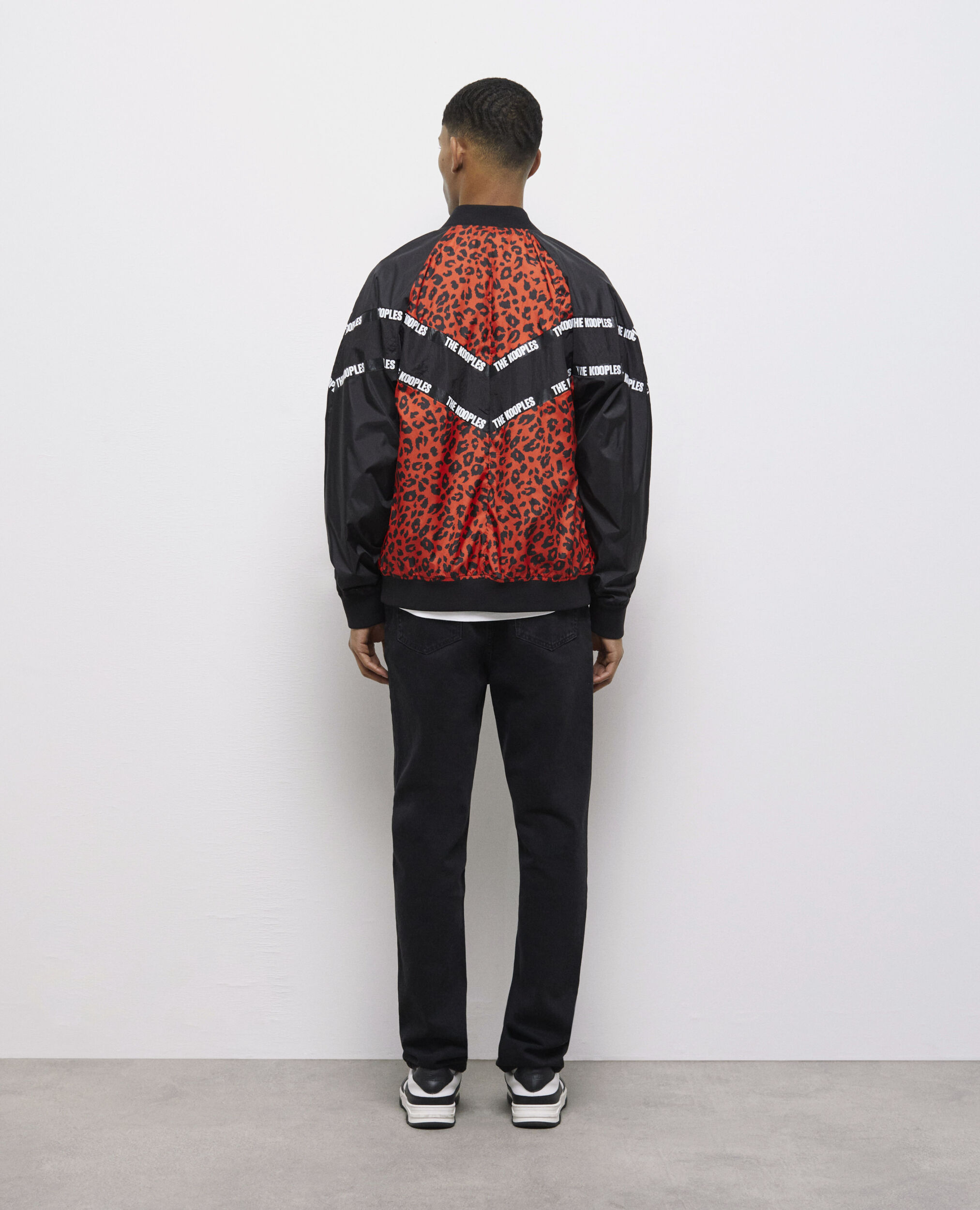 Blouson bicolore avec bandes logo