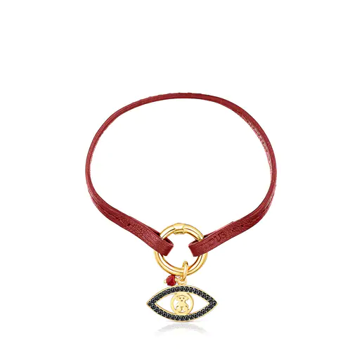 Pulseira TOUS Good Vibes com pingente de olho, banhada a ouro 18k sobre prata, pedras preciosas e couro vermelho.