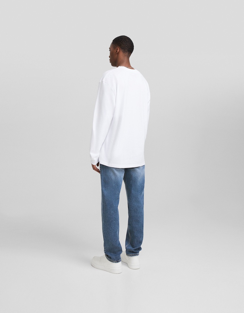calça jeans de corte justo