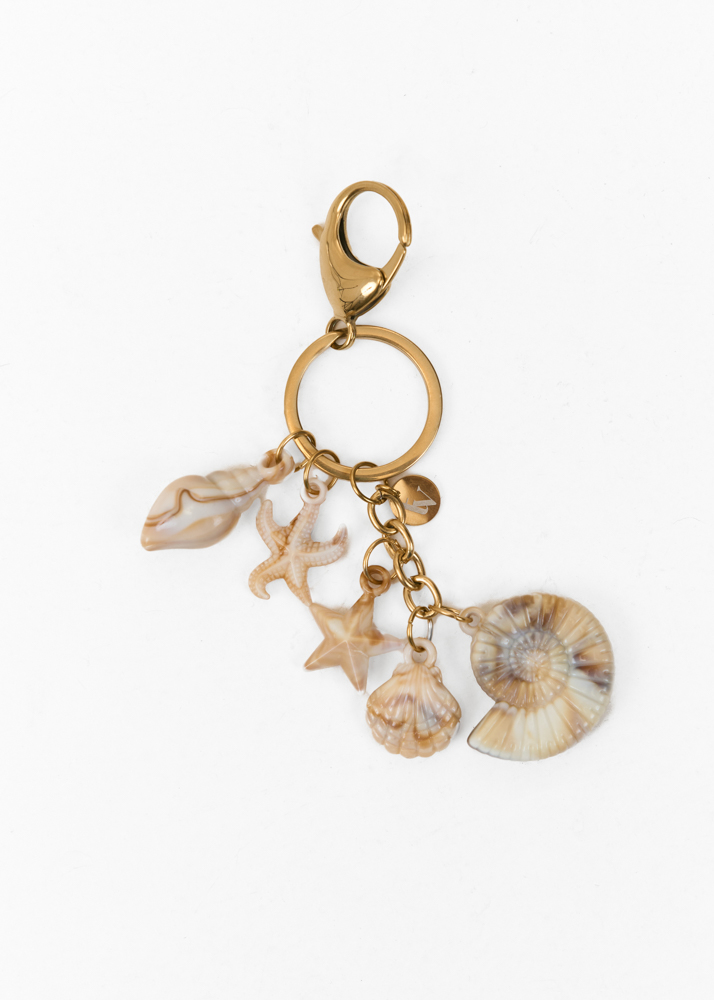 Romy bag charm creme