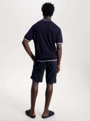 Polo de malha Tommy Hilfiger x Vacation com bordado de bandeira