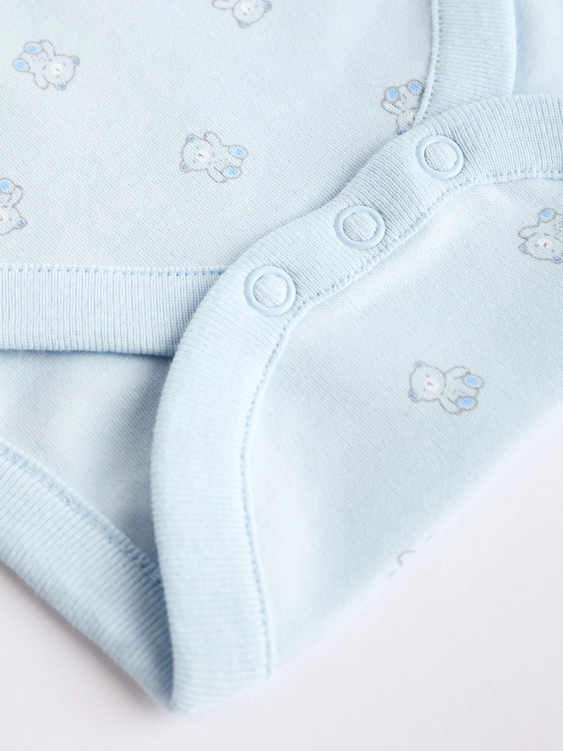 Blauw met beerprint - 5 babyhemdjes