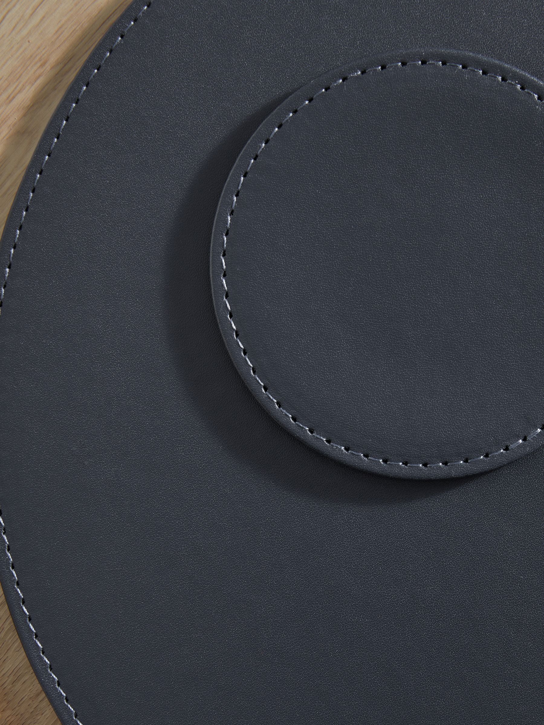 Set van 4 omkeerbare placemats en onderzetters van imitatieleer