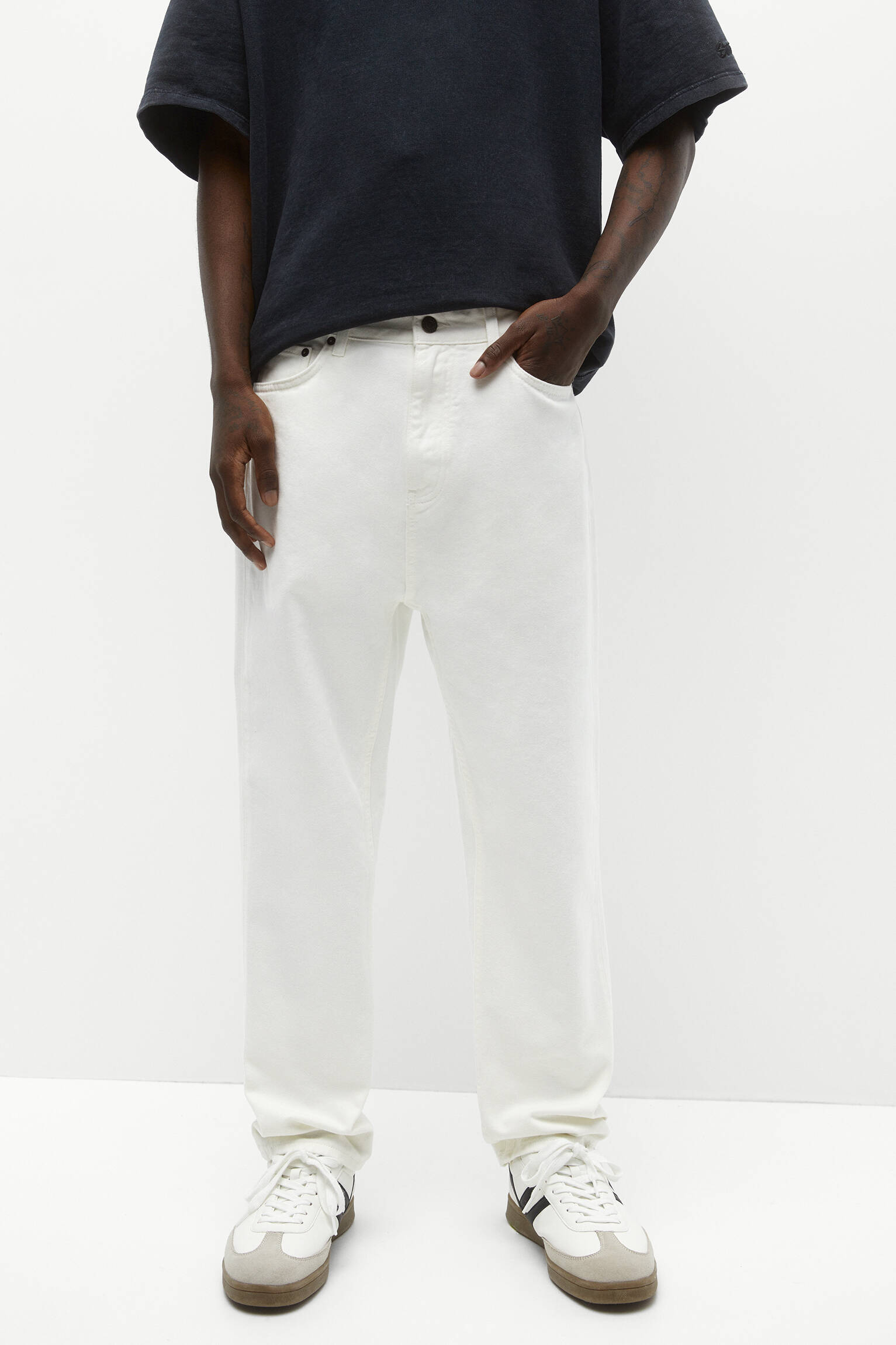 Calça jeans bege de corte relaxado - crua