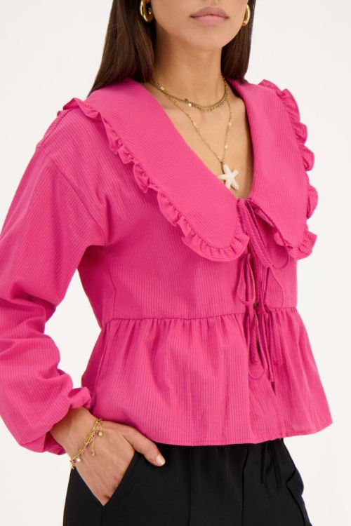 Gestreepte roze blouse met strikjes