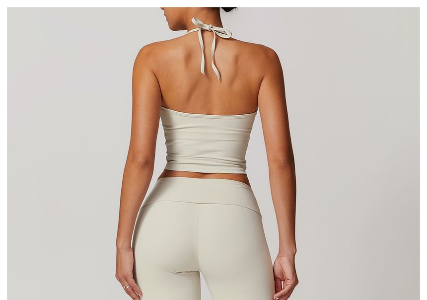 Skinniano - Haltertop met effen padding en open rug, cropped sporttop