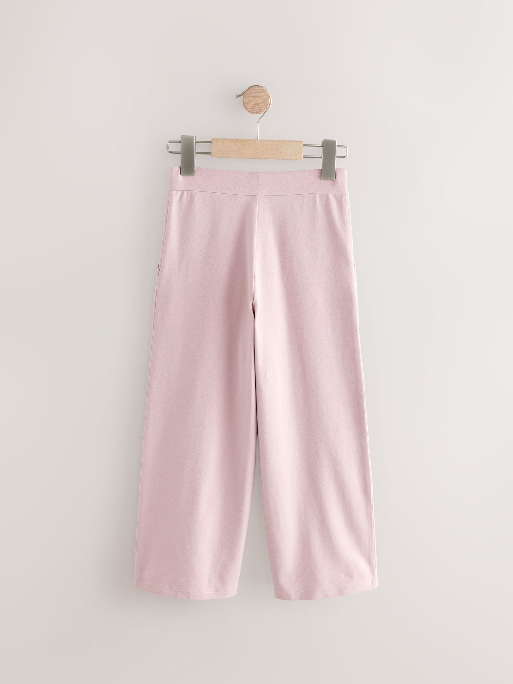 Roze - Jersey broek met wijde pijpen (3-16 jr)