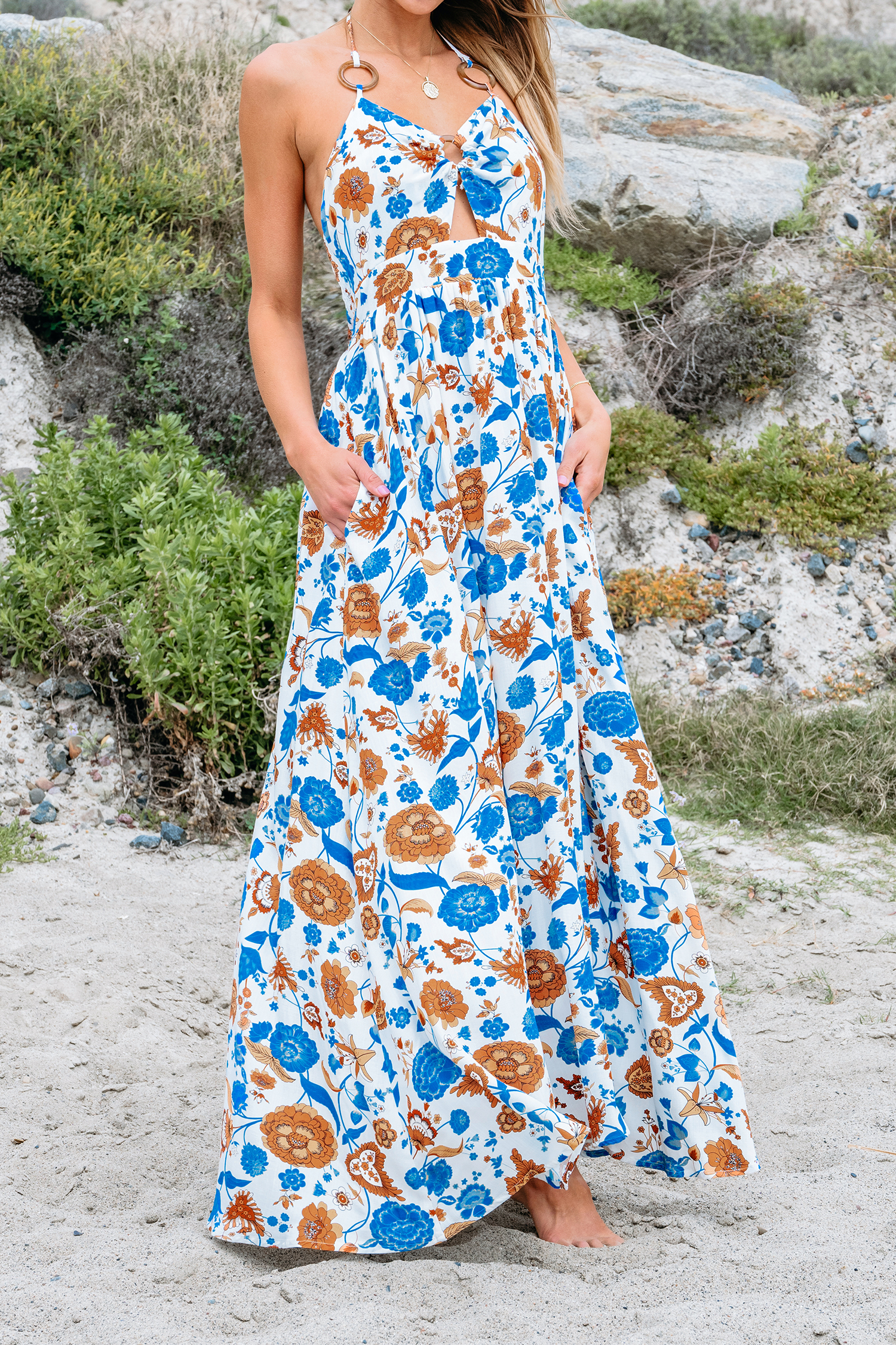 Robe maxi avec col en V et joint torique à imprimé floral