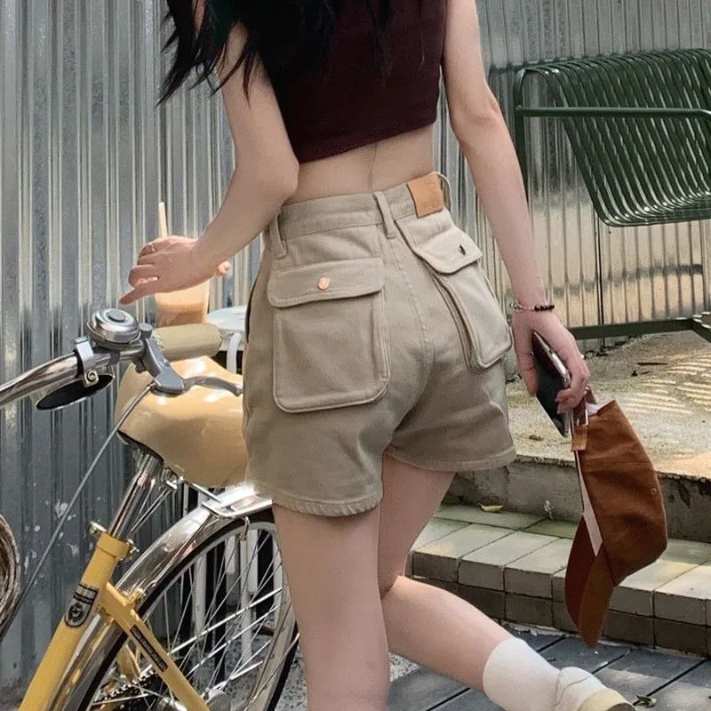Coline - Hoge taille denim cargo shorts met wijde pijpen