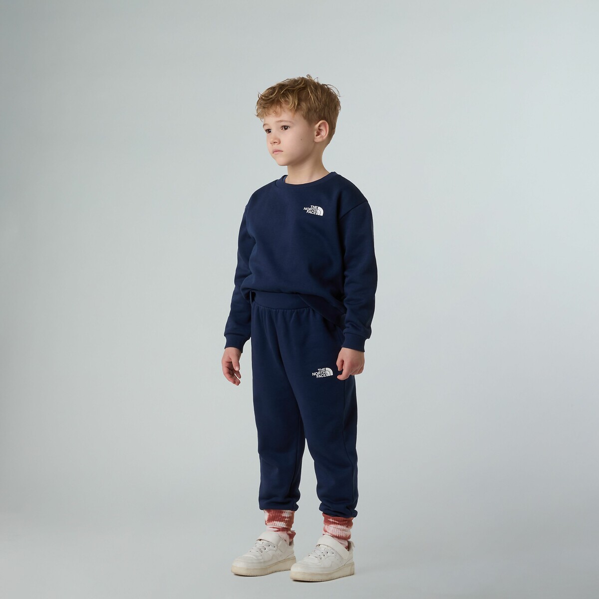 THE NORTH FACE<br>Treino com suéter + broek em molton