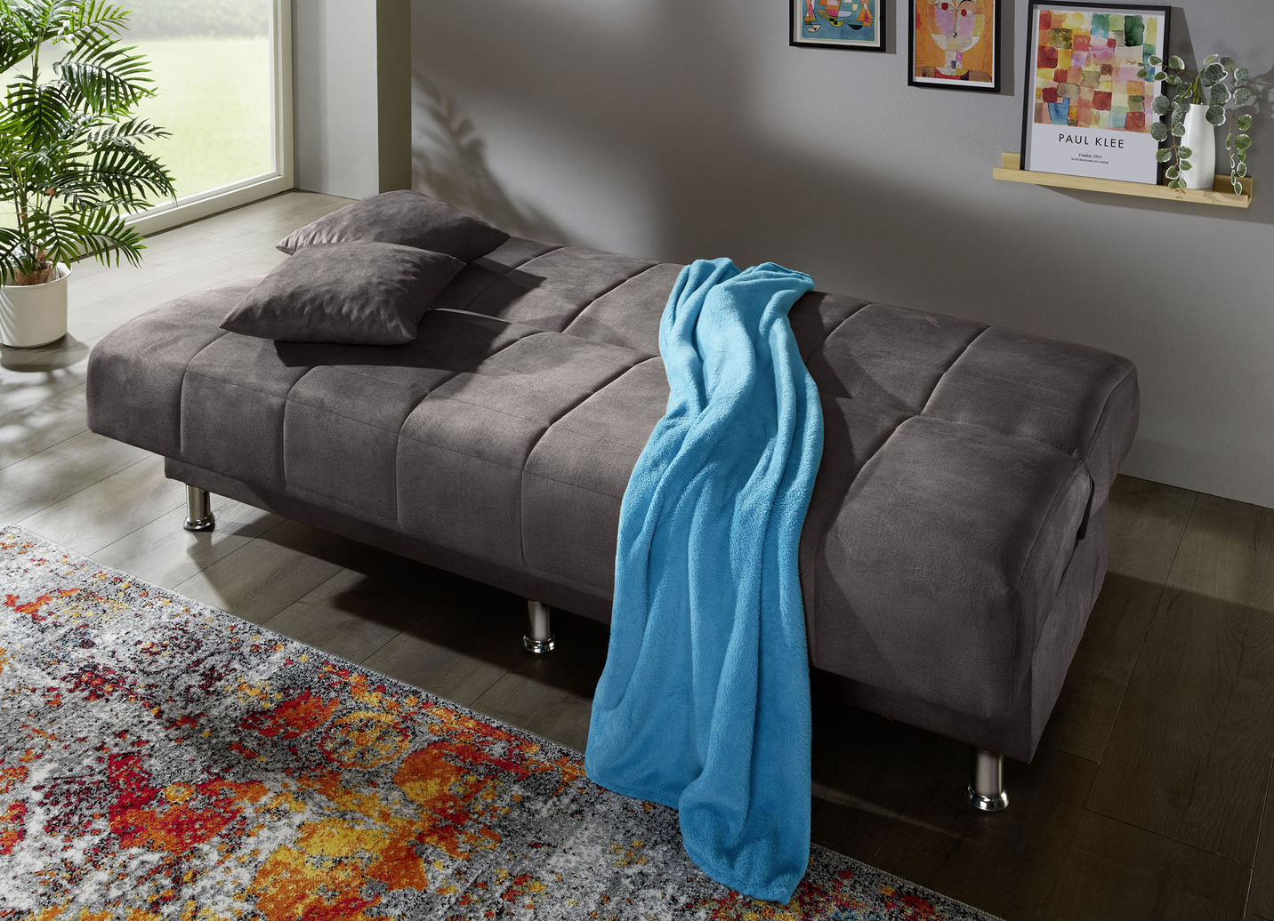 Schlafsofa mit Bettkasten und Dekokissen