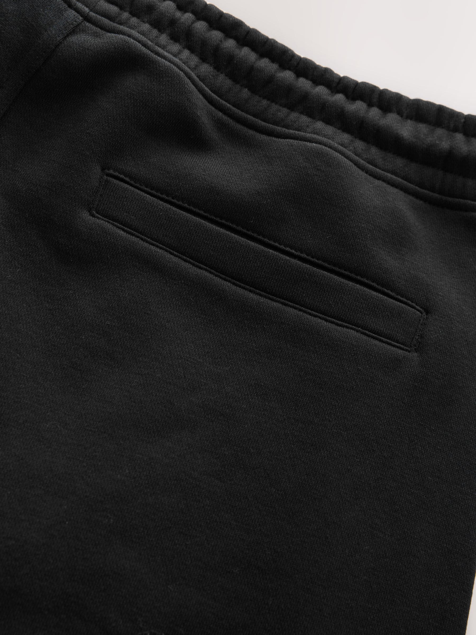 Zwart - Geborstelde jersey shorts met ritszakken