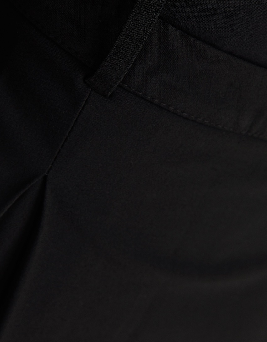 Saia-calça sob medida com pregas caixa
